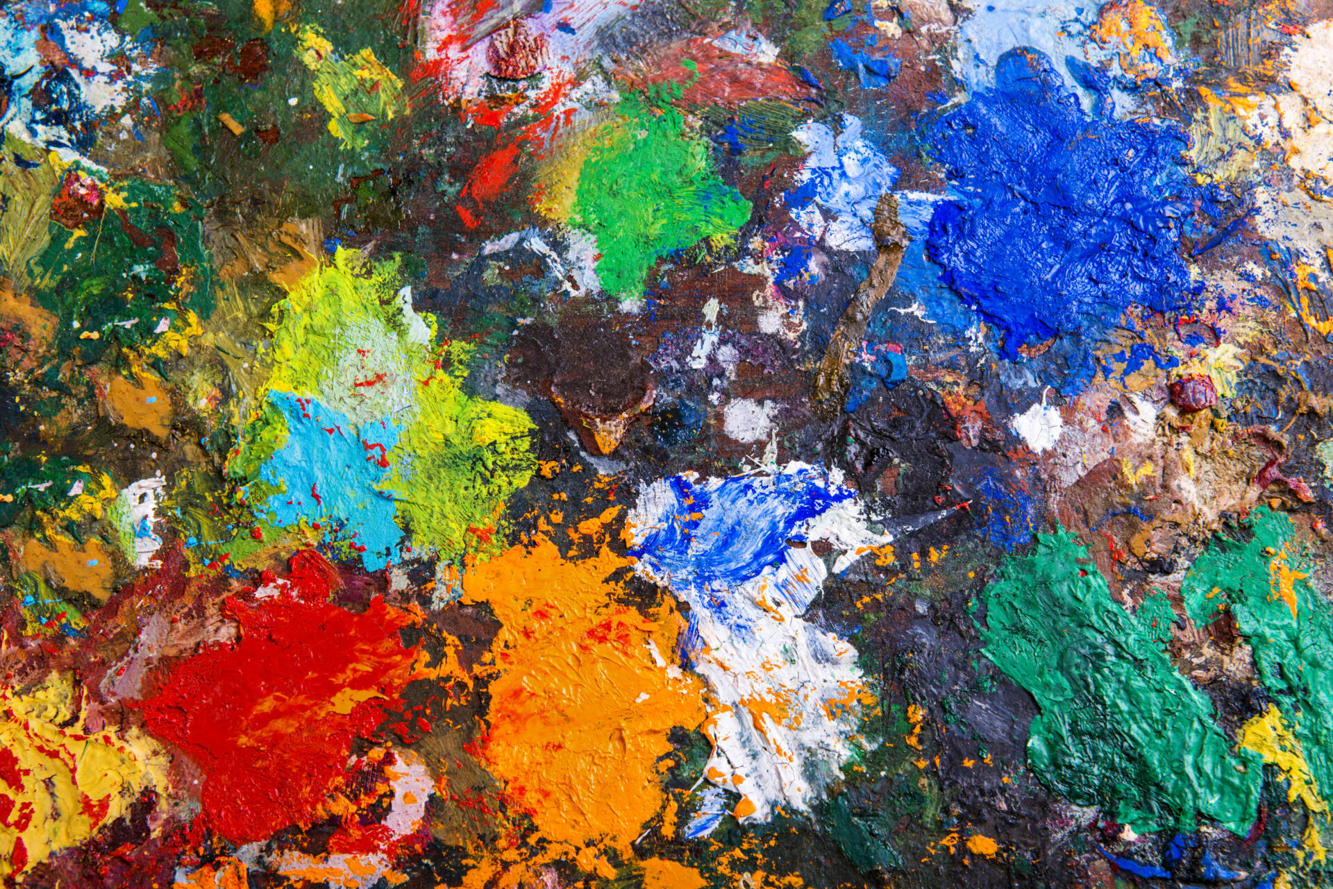 Art palette background with various acrylic paint spots